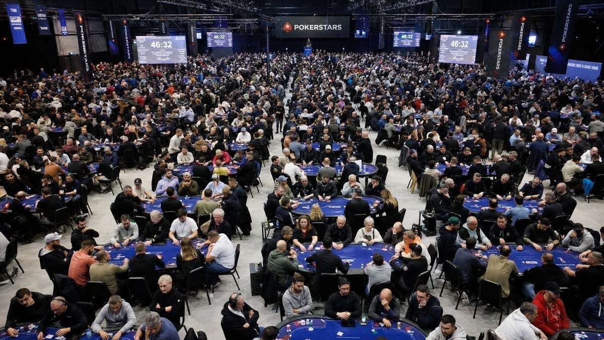 Packed tournament room showing scale of modern poker events